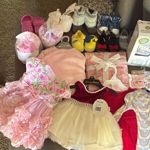 We have a lot of new baby clothes and accessories that has never been wore 0-12